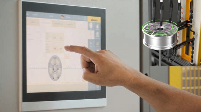 專為汽車(chē)輪轂開(kāi)發(fā)的粉末噴涂系統(tǒng)，通過(guò)觸摸屏進(jìn)行系統(tǒng)配置和控制